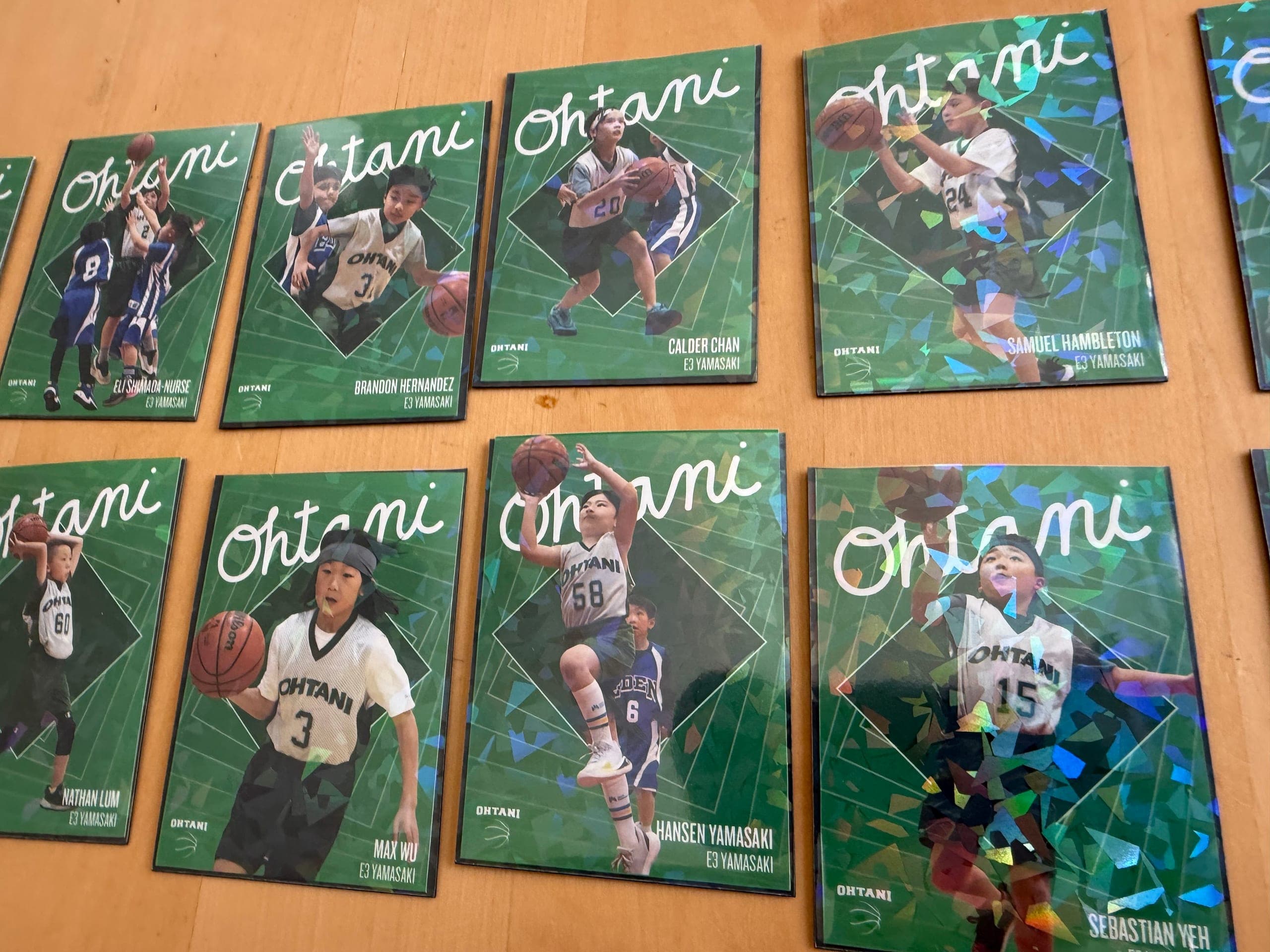 Trading cards for the Ohtani rec basketball team, laid out